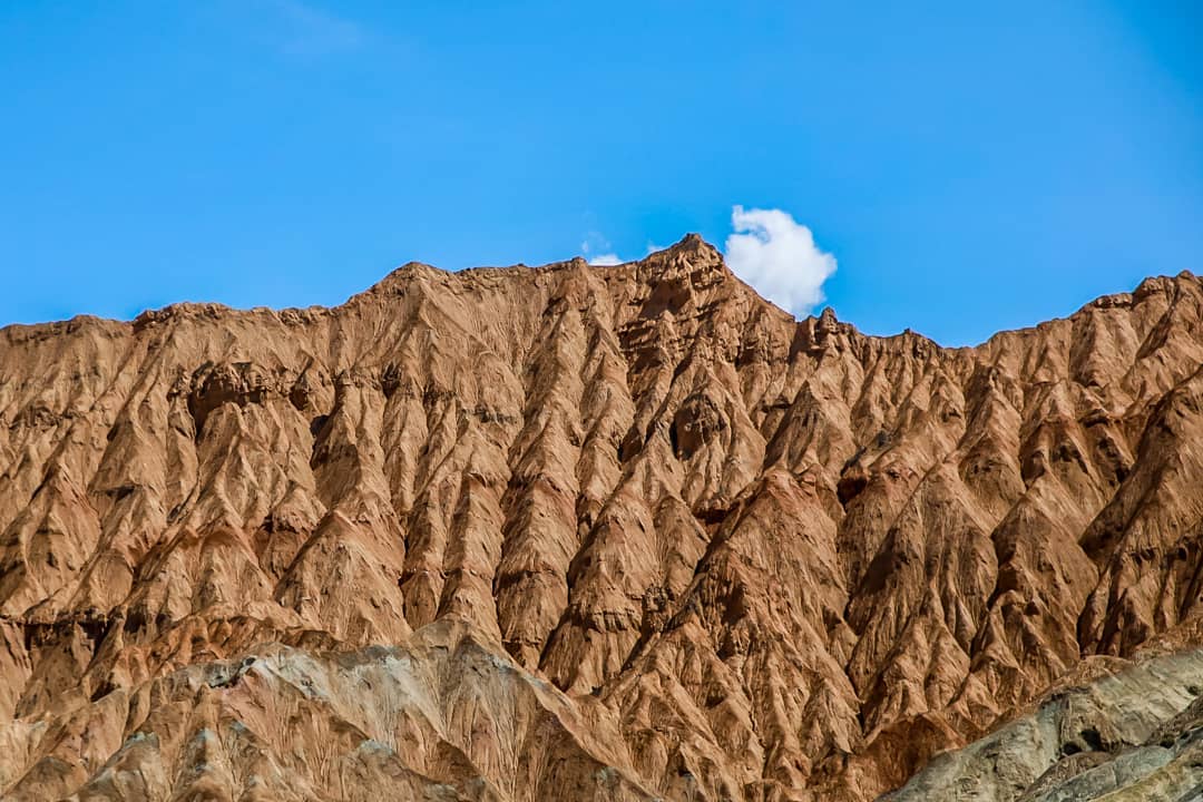 There is a story on the other side of this mountain.